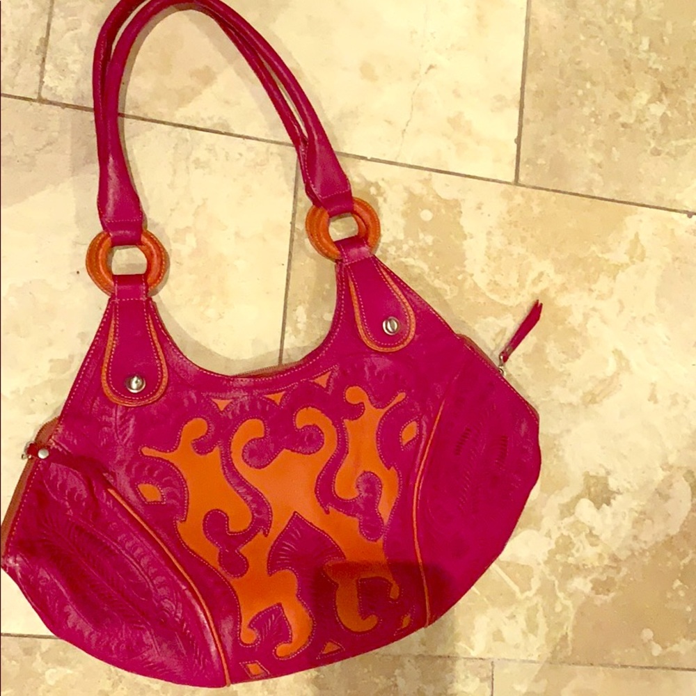 Pink and orange tooled leather bag
